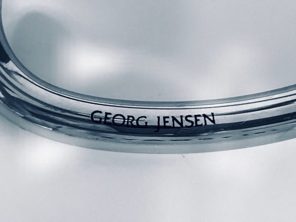 Afbeelding van de Georg Jensen Swing Kandelaar hoogglans rvs die in deze advertentie wordt aangeboden