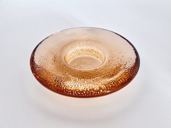 Afbeelding van de Iittala Nappi waxinelichthouder oranje die in deze advertentie wordt aangeboden.