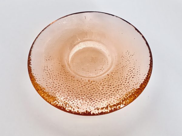 Afbeelding van de Iittala Nappi waxinelichthouder oranje die in deze advertentie wordt aangeboden.