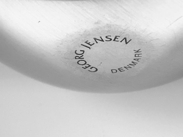 Afbeedling van de Georg Jensen Bloom waxinelichthouders en kandelaars die in deze advertentie worden aangeboden.
