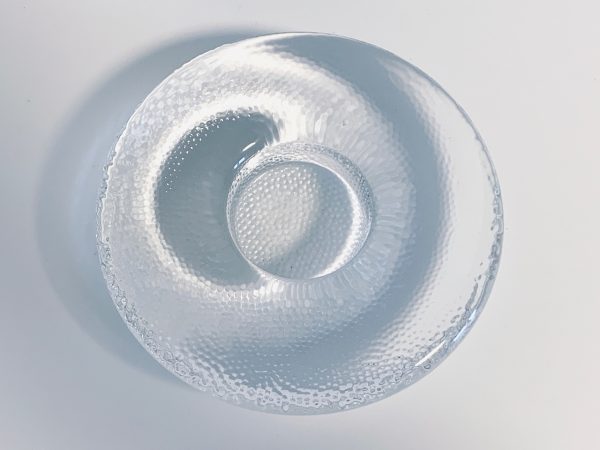Afbeelding van de Iittala Nappi waxinelichthouder transparant die in deze advertentie wordt aangeboden.