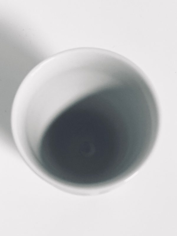 Afbeelding van de Verner Panton Menu beker oranje wit 210 ml die in deze advertentie wordt aangeboden.
