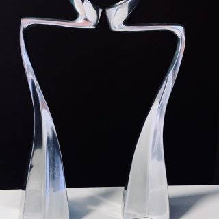 Image of the Matthew Hilton Swan Arclumis candle holders offered in this advertisement.