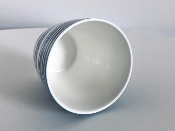 Image of the Iittala Origo mug in the beige color offered in this ad.
