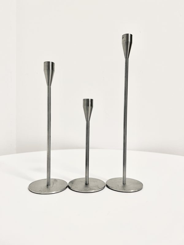 Image of the Piet Hein MINI candlesticks stainless steel set of 3 offered in this advertisement.