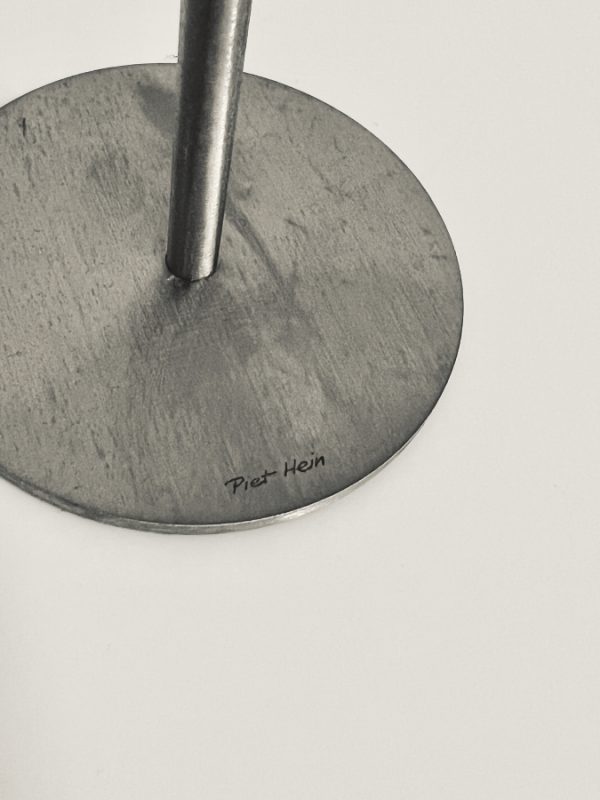 Image of the Piet Hein MINI candlesticks stainless steel set of 3 offered in this advertisement.