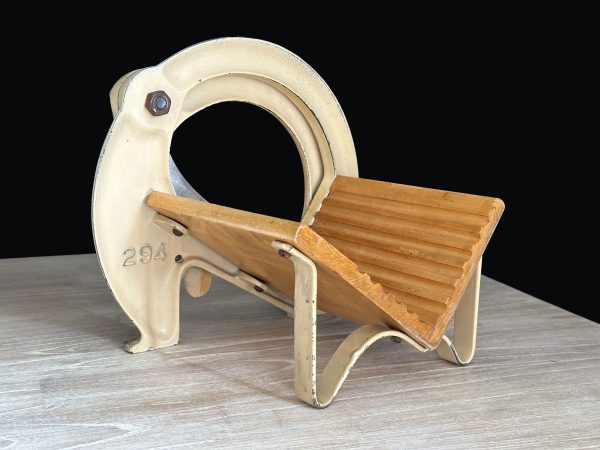 Raadvad broodsnijder beige met groene letters